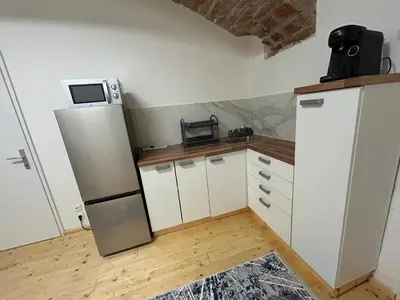 Küche/Küchenzeile in der Unterkunft Cozy Apartment 5th District