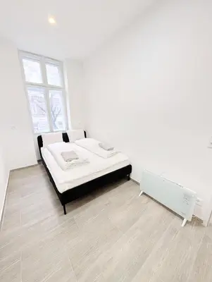 Ein Bett oder Betten in einem Zimmer der Unterkunft Cozy central apartment in Praterstern area