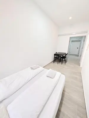 Ein Bett oder Betten in einem Zimmer der Unterkunft Cozy central apartment in Praterstern area