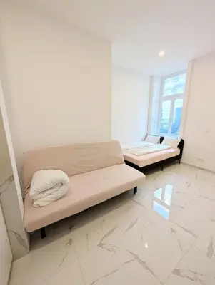 Ein Bett oder Betten in einem Zimmer der Unterkunft Cozy central apartment in Praterstern area 5A