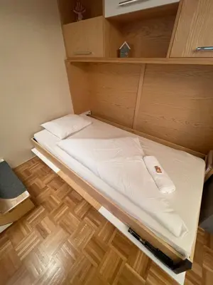 Ein Bett oder Betten in einem Zimmer der Unterkunft Mariahilfer Best Location in Vienna