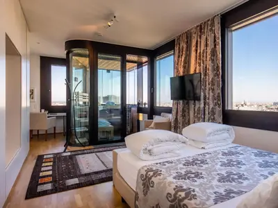 Ein Bett oder Betten in einem Zimmer der Unterkunft Apartment Skyflats City View by Interhome