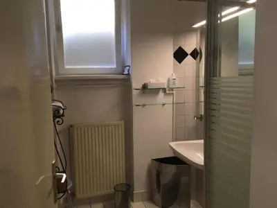 Ein Badezimmer in der Unterkunft Apartment mit Garagenplatz by Interhome