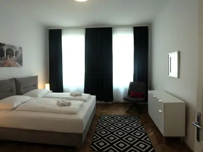 Ein Bett oder Betten in einem Zimmer der Unterkunft Apartment 3-Zimmer Wohnung by Interhome