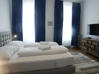 Ein Bett oder Betten in einem Zimmer der Unterkunft Apartment 3-Zimmer Wohnung by Interhome