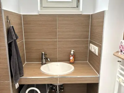 Ein Badezimmer in der Unterkunft Apartment 3-Zimmer Wohnung by Interhome