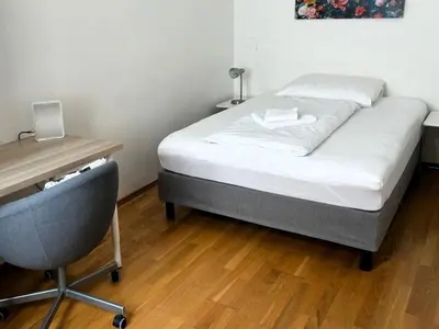 Ein Bett oder Betten in einem Zimmer der Unterkunft Apartment Wohnen am Augarten by Interhome