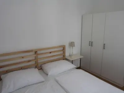 Ein Bett oder Betten in einem Zimmer der Unterkunft Apartment Wohnen am Augarten by Interhome