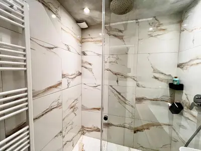 Ein Badezimmer in der Unterkunft TheWICKI 1706 - Wunderschöne Apartments in Wien