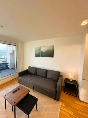 Ein Sitzbereich in der Unterkunft Parkapartments