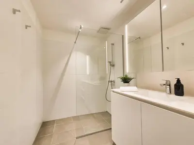 Ein Badezimmer in der Unterkunft Parkapartments