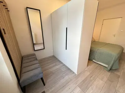 Ein Bett oder Betten in einem Zimmer der Unterkunft Zentrales Messe-Apartment Stuwerstraße - Family & Business Ready