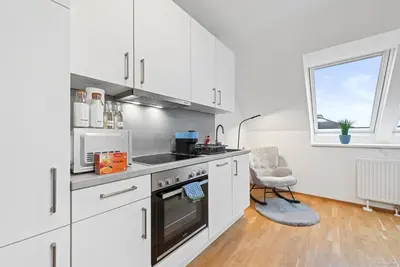 Küche/Küchenzeile in der Unterkunft Nüll Residences 38 - Modern Attic Flat with AC