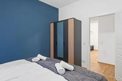 Ein Bett oder Betten in einem Zimmer der Unterkunft Nüll Residences 29 -3 Rooms for Families, Friends & Work