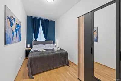 Ein Bett oder Betten in einem Zimmer der Unterkunft Nüll Residences 21 - Big Apartment with 2 Bedrooms