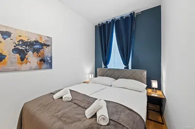 Ein Bett oder Betten in einem Zimmer der Unterkunft Nüll Residences 21 - Big Apartment with 2 Bedrooms