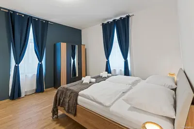 Ein Bett oder Betten in einem Zimmer der Unterkunft Nüll Residences 21 - Big Apartment with 2 Bedrooms