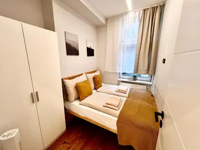 Ein Bett oder Betten in einem Zimmer der Unterkunft TheWICKI 1704 - Wunderschöne Apartments in Wien