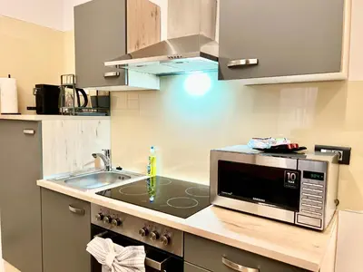 Küche/Küchenzeile in der Unterkunft TheWICKI 1704 - Wunderschöne Apartments in Wien