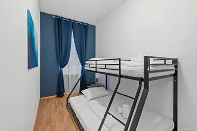 Ein Bett oder Betten in einem Zimmer der Unterkunft Nüll Residences 03 - 2 Bedrooms Close to Main Station
