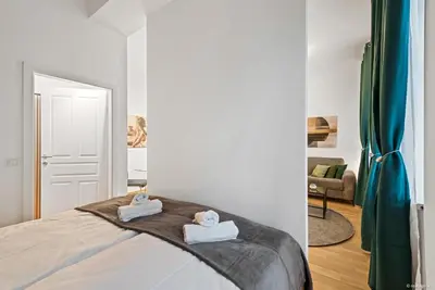 Ein Bett oder Betten in einem Zimmer der Unterkunft Nüll Residences 01 - New Studio close to Main station
