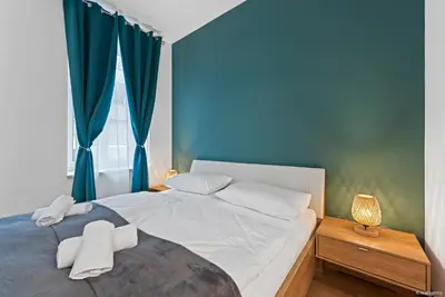 Ein Bett oder Betten in einem Zimmer der Unterkunft Nüll Residences 01 - New Studio close to Main station