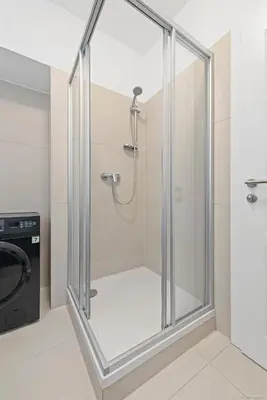 Ein Badezimmer in der Unterkunft Nüll Residences 01 - New Studio close to Main station