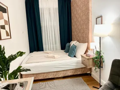 Ein Bett oder Betten in einem Zimmer der Unterkunft TheWICKI 1701 - Wunderschöne Apartments in Wien