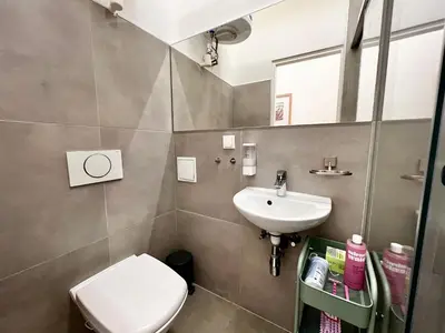 Ein Badezimmer in der Unterkunft TheWICKI 1701 - Wunderschöne Apartments in Wien