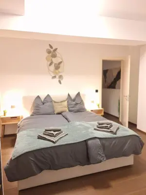 Ein Bett oder Betten in einem Zimmer der Unterkunft SPA & SOUL Residence Neusiedl am See