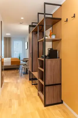 Ein Bett oder Betten in einem Zimmer der Unterkunft OLIVER pulse I Apartments with self check-in