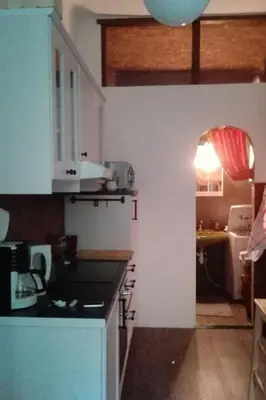 Küche/Küchenzeile in der Unterkunft Apartment Wohnung in Hernals mit Garten- und Strassenblick by Interhome
