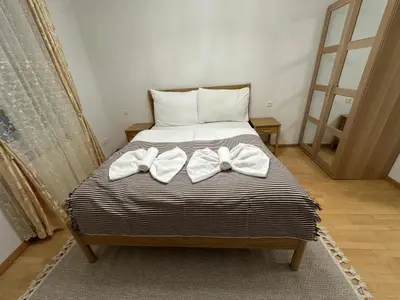 Ein Bett oder Betten in einem Zimmer der Unterkunft Apartments Schubert