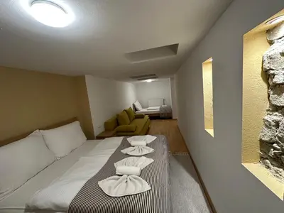 Ein Bett oder Betten in einem Zimmer der Unterkunft Apartments Schubert