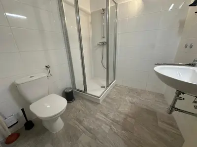 Ein Badezimmer in der Unterkunft Apartments Schubert