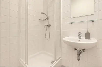 Ein Badezimmer in der Unterkunft Cosy Central Charming Apartment