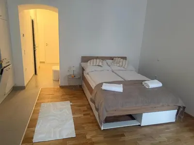 Ein Bett oder Betten in einem Zimmer der Unterkunft MM Luxury Apartment