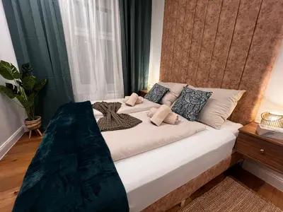 Ein Bett oder Betten in einem Zimmer der Unterkunft TheWICKI 1702 - Wunderschöne Apartments in Wien