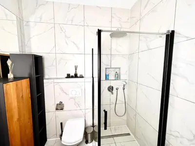 Ein Badezimmer in der Unterkunft TheWICKI 1703 - Wunderschöne Apartments in Wien
