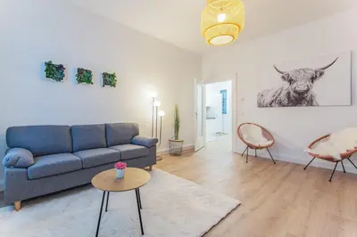 Ein Sitzbereich in der Unterkunft Modern Apartment - 11 minutes to city center
