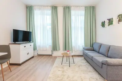 TV/Unterhaltungsangebot in der Unterkunft Modern Apartment - 11 minutes to city center