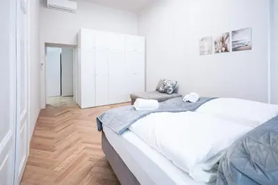 Ein Bett oder Betten in einem Zimmer der Unterkunft BRAND NEW! Apartment Elegance in Vienna's City Center