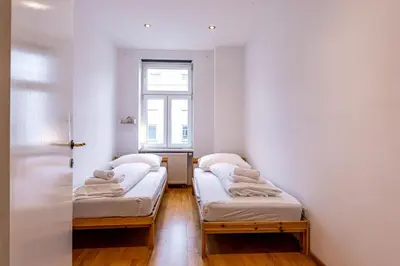 Ein Bett oder Betten in einem Zimmer der Unterkunft Brown Stag Apartments by JR City Apartments