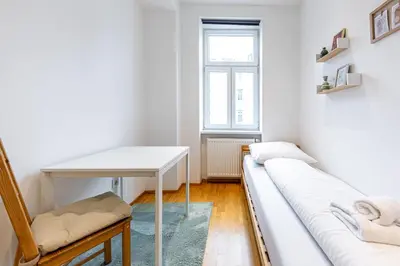 Ein Bett oder Betten in einem Zimmer der Unterkunft Brown Stag Apartments by JR City Apartments