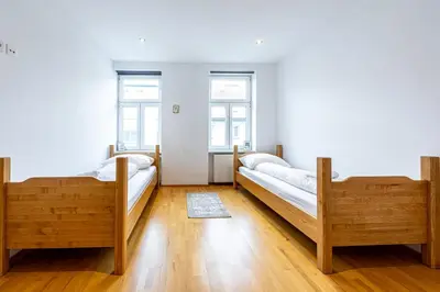 Ein Bett oder Betten in einem Zimmer der Unterkunft Brown Stag Apartments by JR City Apartments
