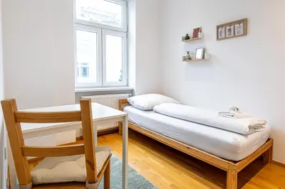 Ein Bett oder Betten in einem Zimmer der Unterkunft Brown Stag Apartments by JR City Apartments