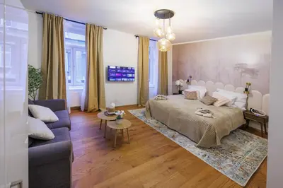 Ein Bett oder Betten in einem Zimmer der Unterkunft Adele deluxe apartment