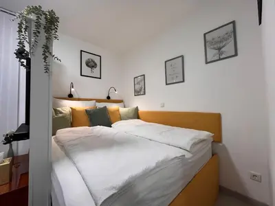 Ein Bett oder Betten in einem Zimmer der Unterkunft Studio marine-green