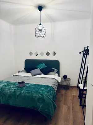 Ein Bett oder Betten in einem Zimmer der Unterkunft Stylish apartment close to Wiener Neustadt