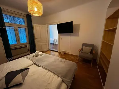 Ein Bett oder Betten in einem Zimmer der Unterkunft Helle DG-Wohnung in Wien I Ruhig, modern & zentral